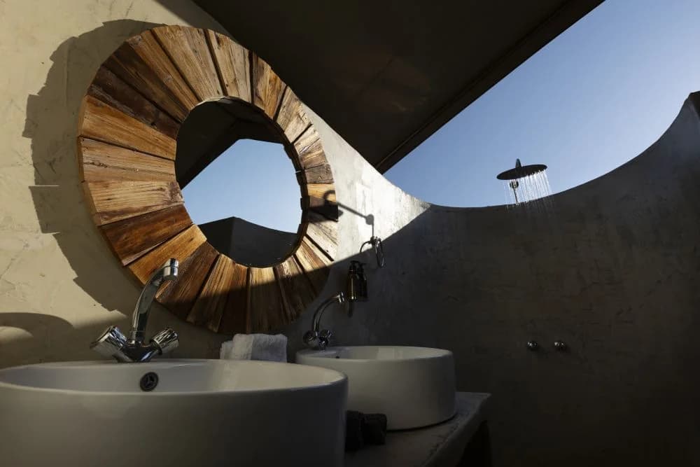 Open-air bathroom with twin basins, Mapesu Wilderness Camp