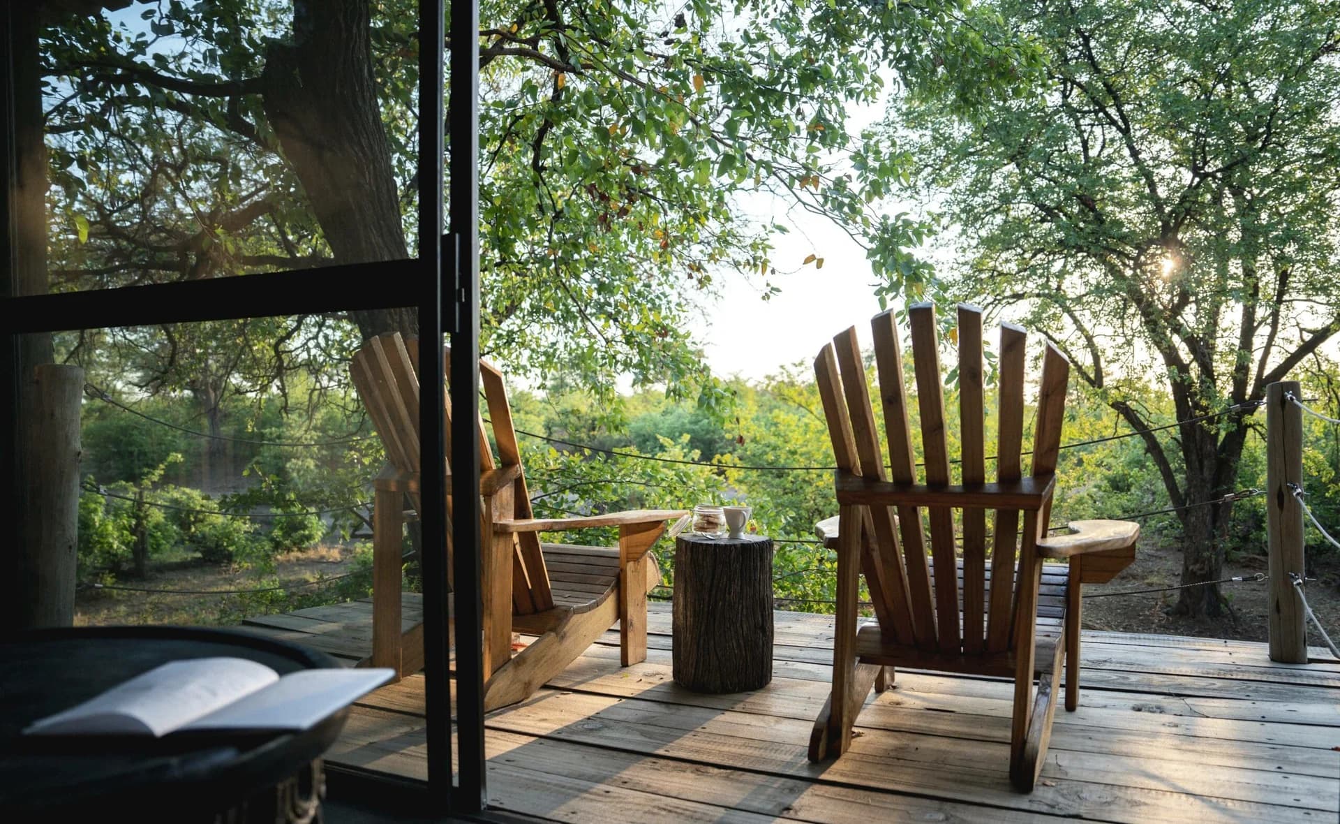 Wooden chair on a private deck, Mashatu Lodge